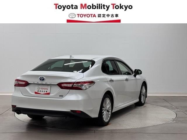 カムリ Gレザーパッケージ 衝突被害軽減 DVDプレーヤー 100V電源 LEDランプ ナビTV 横滑り防止 本革シート 電動シート 地デジTV イモビライザー エアバッグ キーフリー メモリ-ナビ オートクルーズ ABS(2枚目)