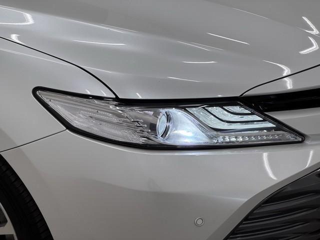 カムリ Gレザーパッケージ 衝突被害軽減 DVDプレーヤー 100V電源 LEDランプ ナビTV 横滑り防止 本革シート 電動シート 地デジTV イモビライザー エアバッグ キーフリー メモリ-ナビ オートクルーズ ABS(19枚目)