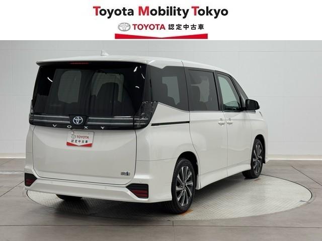 ヴォクシー ハイブリッドS-Z パワーウィンドウ DVD再生機能 インテリキー 横滑防止装置 地デジTV アクティブクルーズコントロール フルオートエアコン リアカメラ エアバッグ ABS 100V充電 ナビTV WAC キーレス(2枚目)