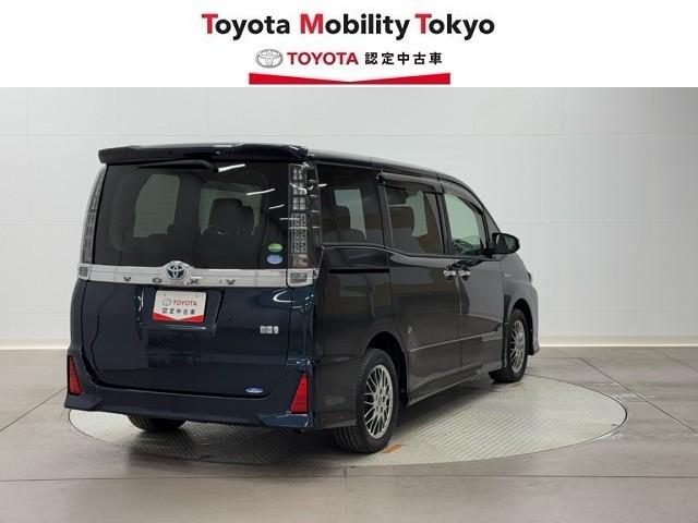 ヴォクシー ハイブリッドＺＳ　煌ＩＩ　電動両側スライドドア　フルフラット　ドライブレコーダ　パワーステアリング　ＤＶＤ再生可　リアクーラー　スマキー　地デジＴＶ　ＡＵＸ　横滑防止　点検記録簿　Ｗエアバック　ＡＡＣ　ＬＥＤランプ　エアバッグ（2枚目）