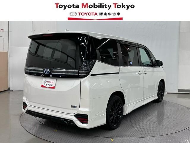 ヴォクシー ハイブリッドS-Z パワーウィンドウ DVD再生機能 インテリキー 横滑防止装置 地デジTV アクティブクルーズコントロール 1オナ フルオートエアコン リアカメラ エアバッグ ABS 100V充電 ナビTV WAC(2枚目)