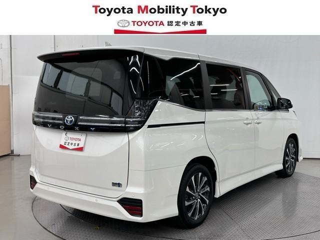 ヴォクシー ハイブリッドS-Z パワーウィンドウ DVD再生機能 インテリキー 横滑防止装置 地デジTV アクティブクルーズコントロール フルオートエアコン リアカメラ エアバッグ ABS 100V充電 ナビTV WAC キーレス(2枚目)