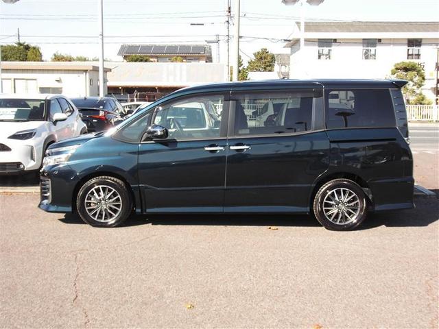 ヴォクシー ＺＳ　煌　地上デジタル　両側パワードア　アイドリングストップ車　パワーウィンド　横滑防止　１オーナ　整備記録簿　ＤＶＤ可　盗難防止装置　スマートエントリー　ＬＥＤヘッドライト　メモリーナビ　３列シート　ＥＴＣ（3枚目）