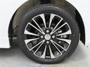 装着タイヤサイズは、165/55R15です。純正アルミホィールを装着しております。