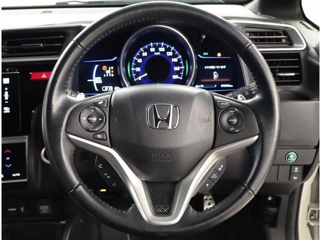 フィットハイブリッド Ｓパッケージ　点検記録簿　フルフラット　アルミ　サイドエアバック　メモリナビ　リアカメラ　ＶＳＡ　クルコン　地デジＴＶ　イモビライザー　パワーウィンドウ　スマキー　ＤＶＤ再生　ナビＴＶ　ＥＴＣ付　ＡＵＸ　パワステ（6枚目）