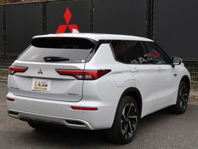 アウトランダーＰＨＥＶ Ｐ　禁煙車　７人乗り　パノラマサンルーフ　ＢＯＳＥスピーカー　ＡＣ１５００Ｗ１００Ｖ電源　衝突被害軽減　車線逸脱警報　後側方車両検知　誤発進抑制機能　全方位カメラ　フロントシートヒーター　本革シート（35枚目）