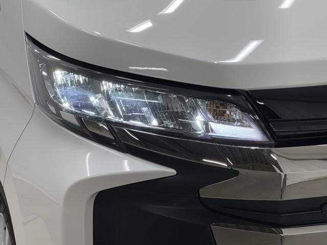 ノア ハイブリッドＳ－Ｇ　両側電動スライドドア　衝突回避ブレーキ　Ｗエアコン　イモビ　レーダークルコン　バックガイドモニター　横滑り防止装置　ＬＥＤヘッドライト　ドライブレコーダー　キーレス　スマートキー　３列シート　記録簿（18枚目）