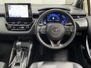 カローラツーリング ハイブリッド　ダブルバイビー　追突軽減ブレーキ　バックモニタ　横滑防止　スマキー　ＬＥＤライト　Ａストップ　デュアルエアバッグ　エアコン　オートクルーズ　サイドエアバッグ　ＥＴＣ付　ナビ　ＰＳ　キーフリー　ＡＢＳ　エアバック（4枚目）