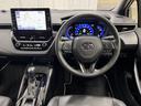 カローラツーリング ハイブリッド ダブルバイビー 追突軽減ブレーキ バックモニタ 横滑防止 スマキー LEDライト AC100V Aストップ デュアルエアバッグ エアコン オートクルーズ サイドエアバッグ ETC付 ナビ PS キーフリー ABS 中古車画像_4