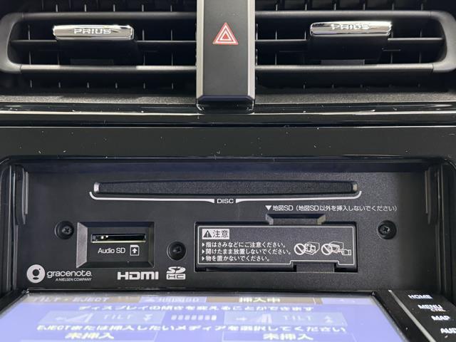 プリウスＰＨＶ Ｓセーフティパッケージ　ＴＳＳ　ＬＥＤヘッド　ＤＶＤ　クルーズコントロール　ナビＴＶ　ＡＣ１００Ｖ電源　ドライブレコーダー　アルミホイール　オートエアコン　横滑り防止装置　記録簿　スマキー　アイドリングストップ　ＥＴＣ（10枚目）