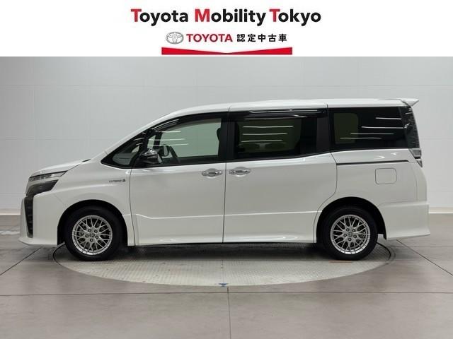 ヴォクシー ハイブリッドZS 煌II 電動両側スライドドア ドライブレコーダ パワーステアリング DVD再生可 リアクーラー スマキー 地デジTV AUX 横滑防止 1オーナー 点検記録簿 Wエアバック AAC LEDランプ エアバッグ(3枚目)