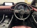 MAZDA3ファストバック Xバーガンディ セレクション クルコン LEDヘッドランプ 革 地デジ 4WD ETC アイドリングストップ アルミホイール 盗難防止装置 ドライブレコーダー 横滑り防止装置 記録簿 スマートキー キーレス オートエアコン DVD(4枚目)