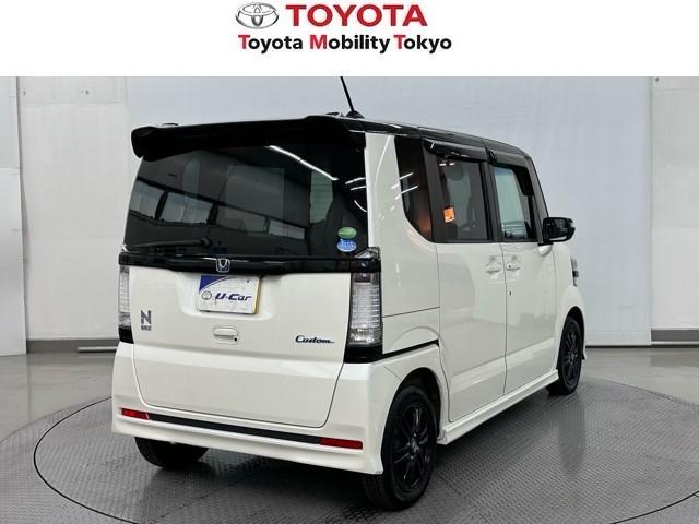 Ｎ－ＢＯＸカスタム Ｇ・Ａパッケージ　追突被害軽減ブレーキ　ｉストップ　サイドＳＲＳ　両側電動ドア　運転席エアバッグ　横滑り防止装置付き　メモリナビ　地デジ　アルミホイール　パワーウインドウ　ナビテレビ　ＤＶＤ　キーレス　盗難防止システム（2枚目）