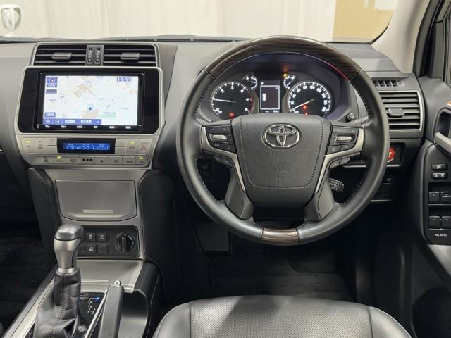 ランドクルーザープラド TX Lパッケージ マットブラックエディション アルミ 寒冷地仕様車 ABS ETC車載器 電動シート 盗難防止装置 メモリーナビ キーレス LEDヘッドランプ レザー クルコン パノラマルーフ スマートエントリー Bカメラ エアコン 記録簿(4枚目)