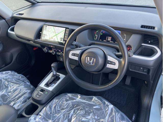 フィット e:HEVホーム ナビ リアカメラ LEDライト ETC VSA サイド/カーテンエアバック クルーズコントロール パーキングセンサー 禁煙車 クリソナ 助手席エアバッグ 運転席エアバッグ 1オナ アイドリングストップ(11枚目)