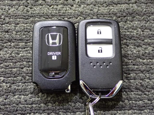 フィット e:HEVクロスター フルオートエアコン 整備記録簿 前後センサー LEDランプ エアバッグ サイドエアバック 地デジ オートクルーズコントロール VSA ETC バックカメラ USB DVD再生可能(48枚目)