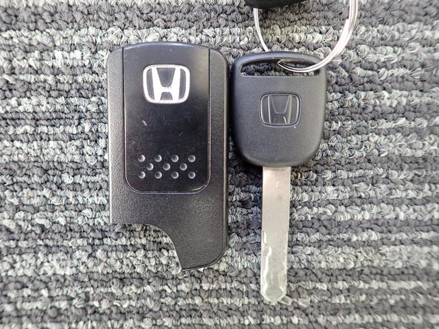 フィット 13G・スマートセレクションファインスタイル インテリキー キーレス フルオートエアコン バックカメラ付き 記録簿有り パワーウィンドウ ETC 両席エアバック エアバック パワステ(46枚目)