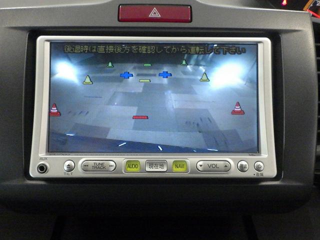 フリード Ｇ　ナビ　リアカメラ　ＥＴＣ　エアバッグ　パワーウィンドウ　助手席エアバッグ　ウォークスルー　キーレス　３列シート　パワーステアリング　両側スライドドア　エアコン　ＡＢＳ　記録簿　バックモニター付き（4枚目）