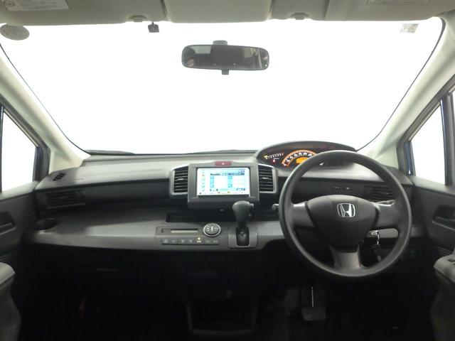 フリード Ｇ　ナビ　リアカメラ　ＥＴＣ　エアバッグ　パワーウィンドウ　助手席エアバッグ　ウォークスルー　キーレス　３列シート　パワーステアリング　両側スライドドア　エアコン　ＡＢＳ　記録簿　バックモニター付き（8枚目）