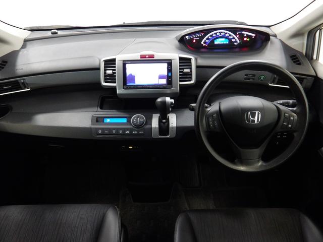 フリード Ｇプレミアムエディション　ナビ　両側オートスライド　ＨＩＤ　スマートキー　リモコンポール　ＥＴＣ　リアカメラ　ベンチシート　ＶＳＡ　クルーズコントロール　盗難防止　Ｂカメラ　記録簿　オートクルーズ　キーレスキー　パワステ（11枚目）