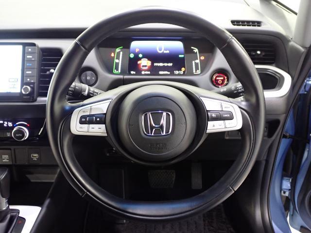 フィット ｅ：ＨＥＶホーム　クリソナ　助手席エアバッグ　運転席エアバッグ　アイドリングストップ　ＬＥＤライト　ＵＳＢ接続　バックカメラ　ＡＢＳ　サイドエアバッグ　オートクルーズコントロール　フルセグＴＶ　記録簿（30枚目）