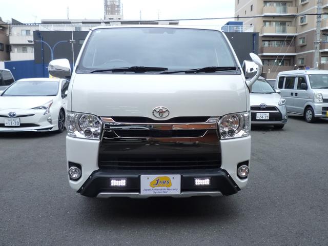 ハイエースバン スーパーGL 50TH アニバーサリーリミテッド ワンオーナー・禁煙車・TRDスポイラー・両側自動ドア・ワーク17インチ・ヒッチメンバー・荷室フローリング・LEDヘッドライト・カロッツェリアナビTV・HDMI/ブルートゥース・ETC・スマートキー(4枚目)