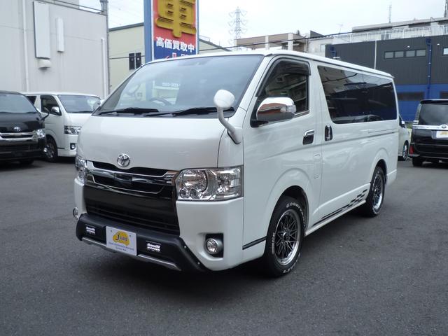 ハイエースバン スーパーGL 50TH アニバーサリーリミテッド ワンオーナー・禁煙車・TRDスポイラー・両側自動ドア・ワーク17インチ・ヒッチメンバー・荷室フローリング・LEDヘッドライト・カロッツェリアナビTV・HDMI/ブルートゥース・ETC・スマートキー(6枚目)