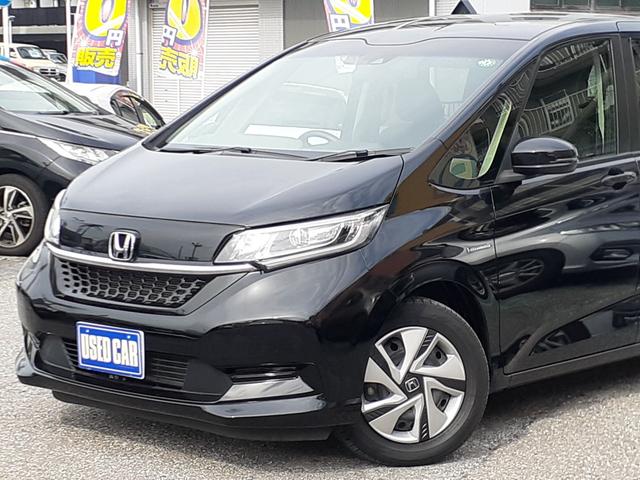フリードハイブリッド ハイブリッド・Ｇホンダセンシング　禁煙車　後期型　両側電動スライドドア　Ａクルコン　ＥＴＣ　ＬＥＤヘッドライト　プッシュスタート　オートエアコン　社外ナビ　Ｂｌｕｅｔｏｏｔｈ　ＤＶＤ再生　ＳＤ　ＵＳＢ　バックカメラ　除菌　サンシェード（11枚目）