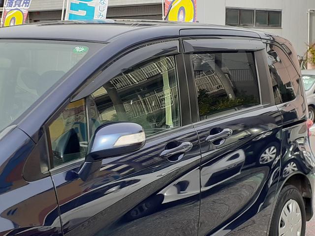 フリード Ｇ　ジャストセレクション　電動スライドドア　キセノンヘッドライト　オートライト　スマートキー　ＥＴＣ　純正ＨＤＤインターナビ　ＴＶ　ミュージックサーバー　ＤＶＤ再生　ＶＩＤＥＯ　バックカメラ　除菌（20枚目）