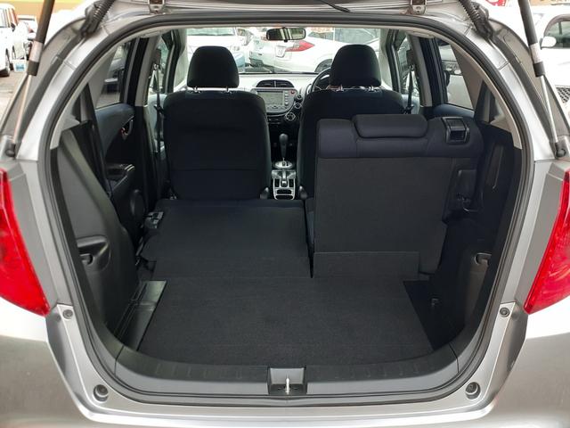 フィット Ｇ　ハイウェイエディション　禁煙車　キセノンヘッドライト　オートライト　ＥＴＣ　純正ＨＤＤインターナビ　ミュージックサーバー　テレビ　ＤＶＤ再生　ＶＩＤＥＯ　バックカメラ　キーレス　電動格納ミラー　ドアバイザー　除菌（25枚目）