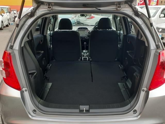 フィット Ｇ　ハイウェイエディション　禁煙車　キセノンヘッドライト　オートライト　ＥＴＣ　純正ＨＤＤインターナビ　ミュージックサーバー　テレビ　ＤＶＤ再生　ＶＩＤＥＯ　バックカメラ　キーレス　電動格納ミラー　ドアバイザー　除菌（26枚目）