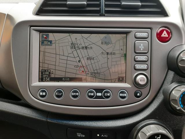 フィット Ｇ　ハイウェイエディション　禁煙車　キセノンヘッドライト　オートライト　ＥＴＣ　純正ＨＤＤインターナビ　ミュージックサーバー　テレビ　ＤＶＤ再生　ＶＩＤＥＯ　バックカメラ　キーレス　電動格納ミラー　ドアバイザー　除菌（36枚目）