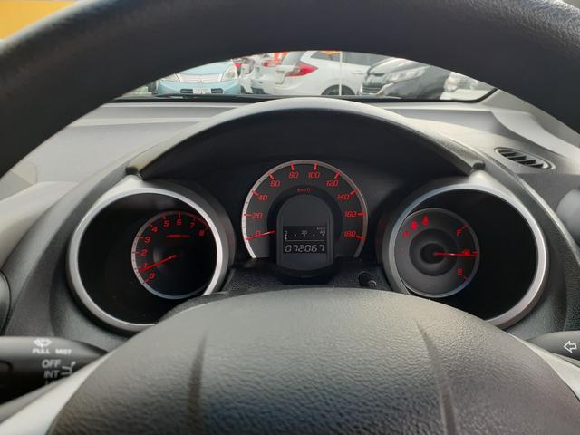 フィット Ｇ　ハイウェイエディション　禁煙車　キセノンヘッドライト　オートライト　ＥＴＣ　純正ＨＤＤインターナビ　ミュージックサーバー　テレビ　ＤＶＤ再生　ＶＩＤＥＯ　バックカメラ　キーレス　電動格納ミラー　ドアバイザー　除菌（80枚目）