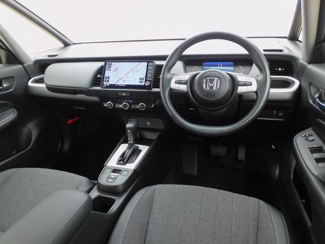 フィット e:HEVホーム ホンダセンシング 純正9インチメモリーナビ(CD録音・DVD・地デジ・Bluetoothオーディオ)  バックカメラ ETC2.0 LEDヘッドライト コーナーセンサー(3枚目)