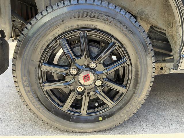 ハイゼットカーゴ クルーズターボリミテッド カスタム仕様!ハイルーフ!禁煙車!ターボ!5速マニュアル!SEIN SSアルミホイール!ドライブレコーダー!ディーラーオプションオーバーヘッドコンソール!キーレスエントリー!電動格納ミラー!フォグ!(12枚目)