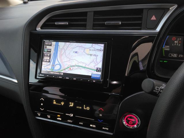 シャトル ハイブリッド　ホンダセンシング　ストラーダＳＤナビ☆Ｂｌｕｅｔｏｏｔｈ☆バックカメラ☆セルスタードラレコ☆アダクティブクルコン☆レーンキープ☆オートライト☆ソナー☆衝突軽減ブレーキ☆純正トノカバー☆禁煙車☆スマートキー☆ＥＴＣ（30枚目）