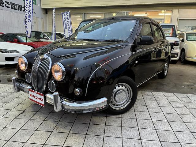 ビュート 12ST 光岡車☆オプション専用ウッド×赤革インパネ☆ストラーダSDナビ☆フルセグTV☆DVD再生☆ルームミラー型前後ドラレコ☆ETC☆赤革シートカバー☆禁煙車☆キーレスキー☆(2枚目)