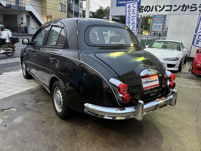 ビュート 12ST 光岡車☆オプション専用ウッド×赤革インパネ☆ストラーダSDナビ☆フルセグTV☆DVD再生☆ルームミラー型前後ドラレコ☆ETC☆赤革シートカバー☆禁煙車☆キーレスキー☆(9枚目)