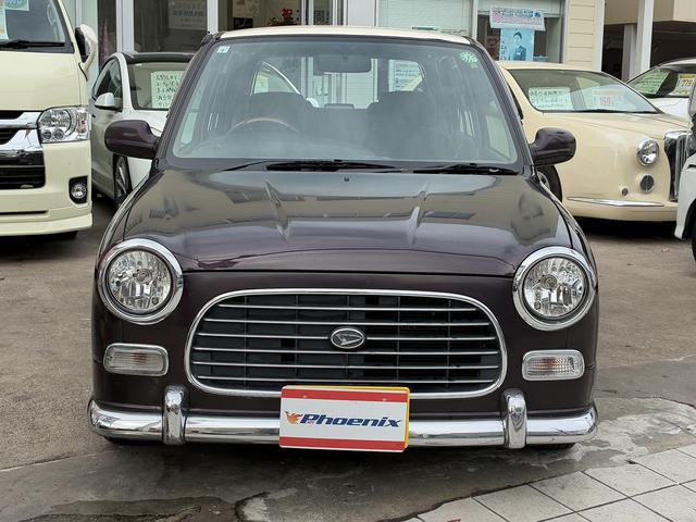 ミラジーノ ジーノ　禁煙車！ストラーダメモリーナビ！Ｂｌｕｅ　ｔｏｏｔｈ！前後メッキバンパー！メッキリング１３インチホイール！ローダウン！ウッドコンビハンドル！ウッドパネル！キーレス！２トーンカラー！（4枚目）