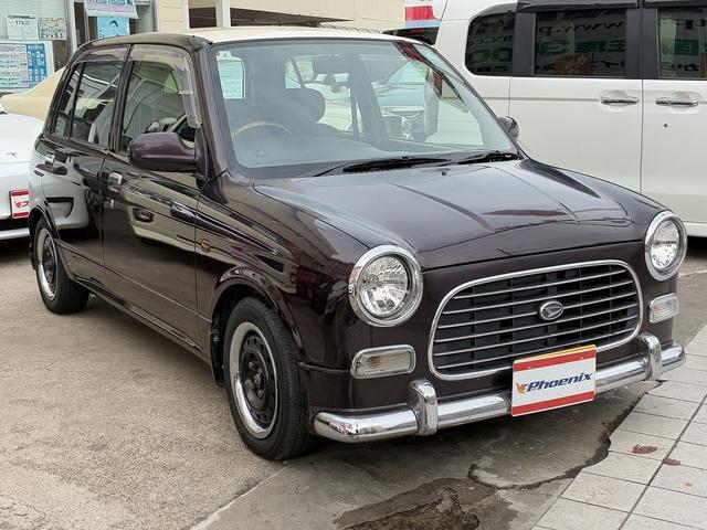 ミラジーノ ジーノ　禁煙車！ストラーダメモリーナビ！Ｂｌｕｅ　ｔｏｏｔｈ！前後メッキバンパー！メッキリング１３インチホイール！ローダウン！ウッドコンビハンドル！ウッドパネル！キーレス！２トーンカラー！（5枚目）