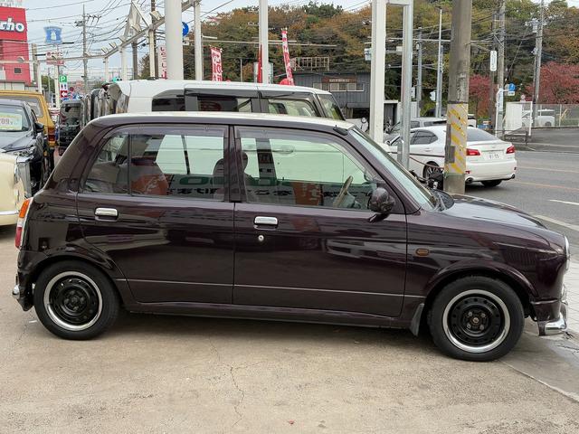 ミラジーノ ジーノ　禁煙車！ストラーダメモリーナビ！Ｂｌｕｅ　ｔｏｏｔｈ！前後メッキバンパー！メッキリング１３インチホイール！ローダウン！ウッドコンビハンドル！ウッドパネル！キーレス！２トーンカラー！（6枚目）