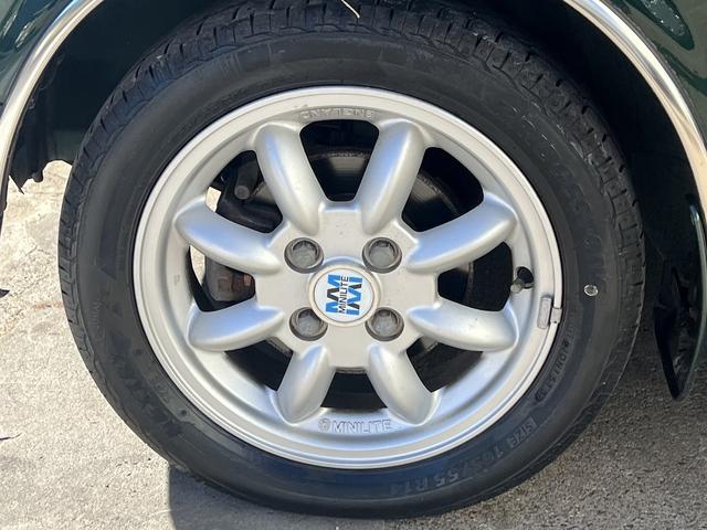 ミラジーノ１０００ Ｘ　走行８０００ＫＭ代☆純正オーディオ☆ウッドパネル☆ウッドコンピハンドル☆ミニライトスペシャル１４インチアルミホイール☆レザーシート☆フォグ☆メッキパーツ☆電格ミラー☆キーレスキー☆１０００ＣＣジーノ☆（65枚目）