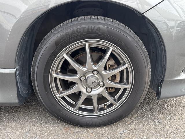 フィットシャトルハイブリッド ハイブリッド・ナビプレミアムセレクション　禁煙車　ＨＤＤナビ　バックカメラ　ワンセグ　ＤＶＤ　ハーフレザーシート　ＨＩＤ　ＥＴＣ　クルーズコントロール　横滑り防止装置　スマートキー　社外１５インチＡＷ　タイミングチェーン（64枚目）