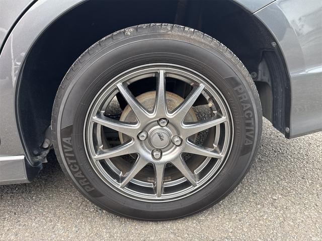 フィットシャトルハイブリッド ハイブリッド・ナビプレミアムセレクション　禁煙車　ＨＤＤナビ　バックカメラ　ワンセグ　ＤＶＤ　ハーフレザーシート　ＨＩＤ　ＥＴＣ　クルーズコントロール　横滑り防止装置　スマートキー　社外１５インチＡＷ　タイミングチェーン（65枚目）