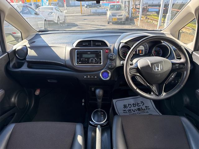 フィットシャトルハイブリッド ハイブリッド・スマートセレクション 禁煙車 USB接続 CD ハーフレザーシート HID ETC スマートキー 横滑り防止装置 社外15インチAW タイミングチェーン(8枚目)