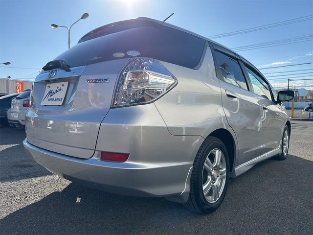 フィットシャトルハイブリッド ハイブリッド・スマートセレクション 禁煙車 USB接続 CD ハーフレザーシート HID ETC スマートキー 横滑り防止装置 社外15インチAW タイミングチェーン(51枚目)