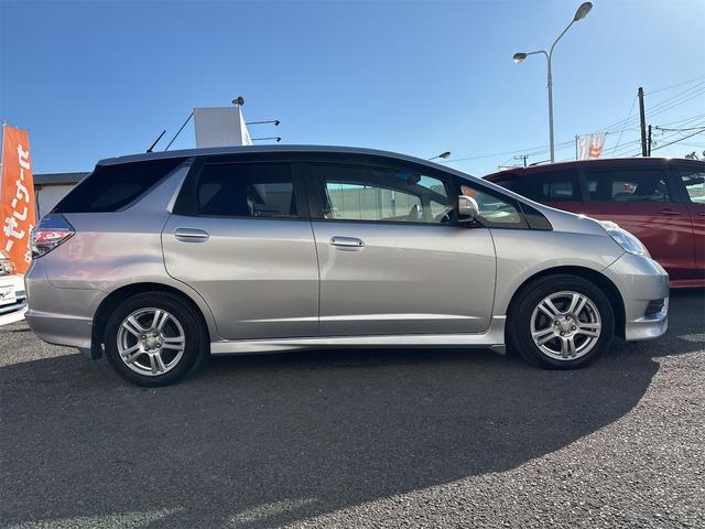 フィットシャトルハイブリッド ハイブリッド・スマートセレクション 禁煙車 USB接続 CD ハーフレザーシート HID ETC スマートキー 横滑り防止装置 社外15インチAW タイミングチェーン(53枚目)