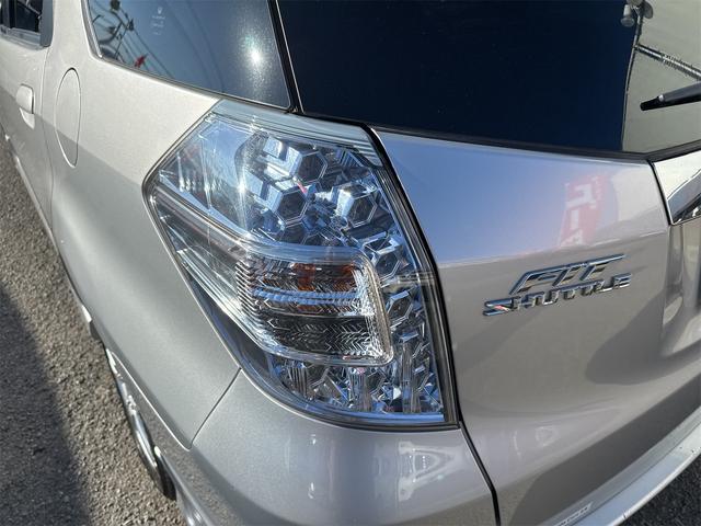 フィットシャトルハイブリッド ハイブリッド・スマートセレクション 禁煙車 USB接続 CD ハーフレザーシート HID ETC スマートキー 横滑り防止装置 社外15インチAW タイミングチェーン(59枚目)