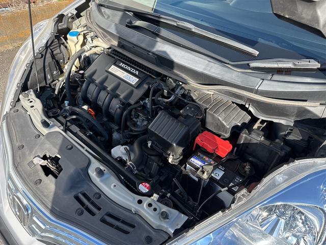 フィットシャトルハイブリッド ハイブリッド・スマートセレクション 禁煙車 USB接続 CD ハーフレザーシート HID ETC スマートキー 横滑り防止装置 社外15インチAW タイミングチェーン(66枚目)