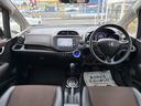 フィットシャトルハイブリッド ハイブリッド・ナビプレミアムセレクション　禁煙車　ＨＤＤナビ　バックカメラ　ワンセグ　ＤＶＤ　ハーフレザーシート　ＨＩＤ　ＥＴＣ　クルーズコントロール　横滑り防止装置　スマートキー　社外１５インチＡＷ　タイミングチェーン（8枚目）